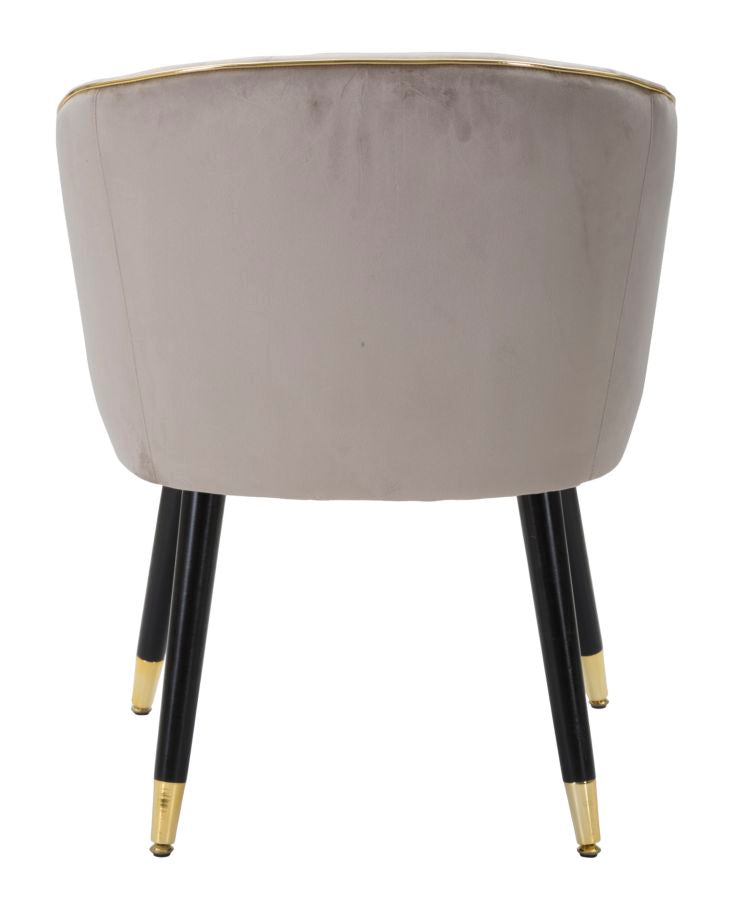 Grauer gepolsterter Sessel mit schwarzen Holzbeinen und goldenen Details