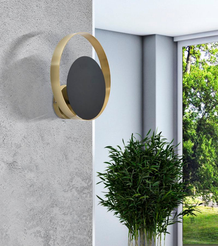 Geometrische runde Wandleuchte aus Metall in Gold und Schwarz