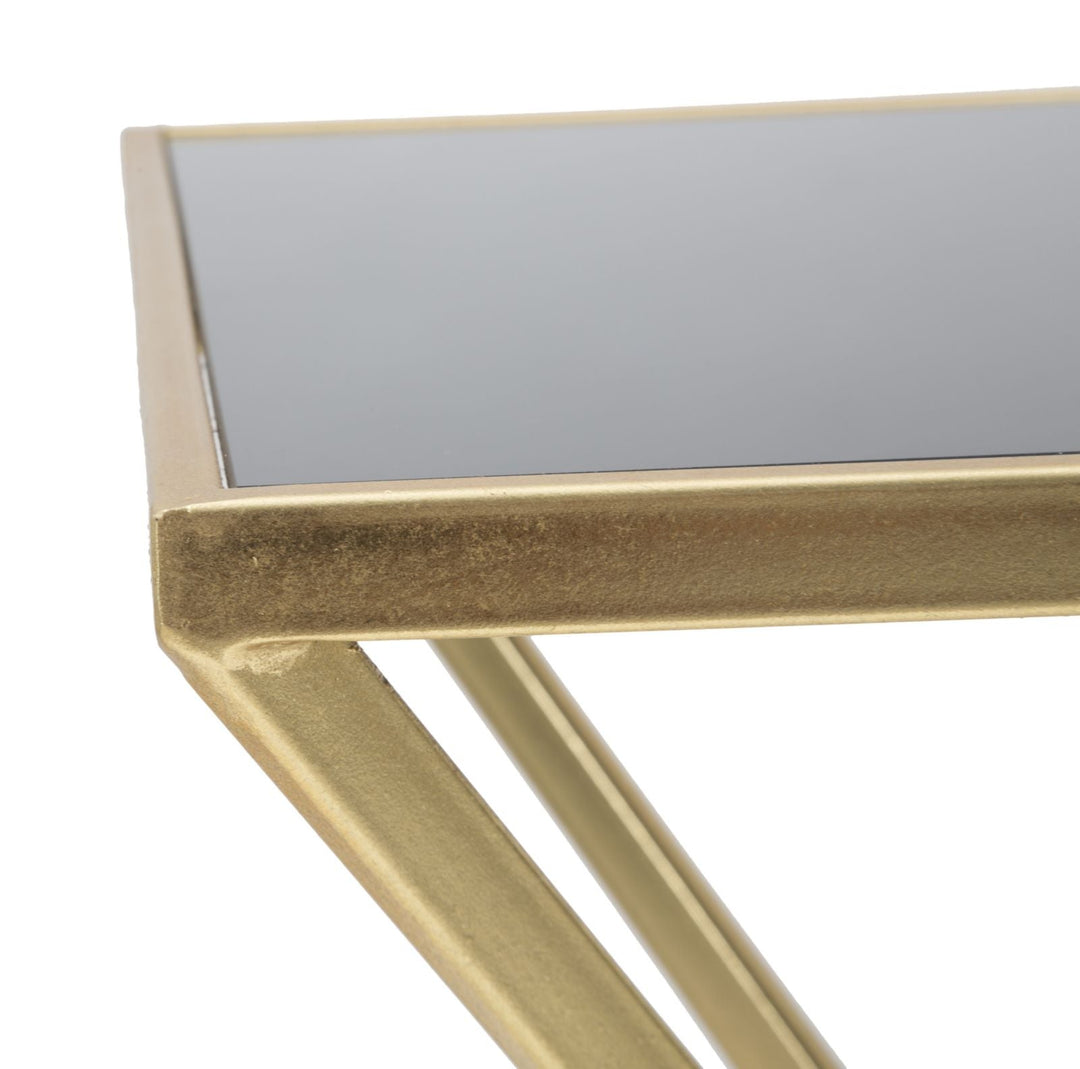 Kleiner Couchtisch aus Metall in Gold und Schwarz mit pyramidenförmigen Beinen