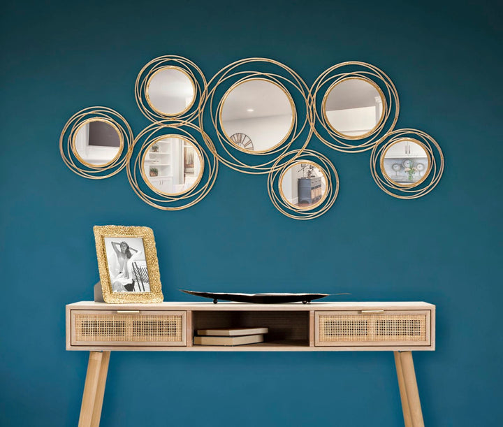 Kleine runde goldene Wandspiegel (moderne Dekoration)