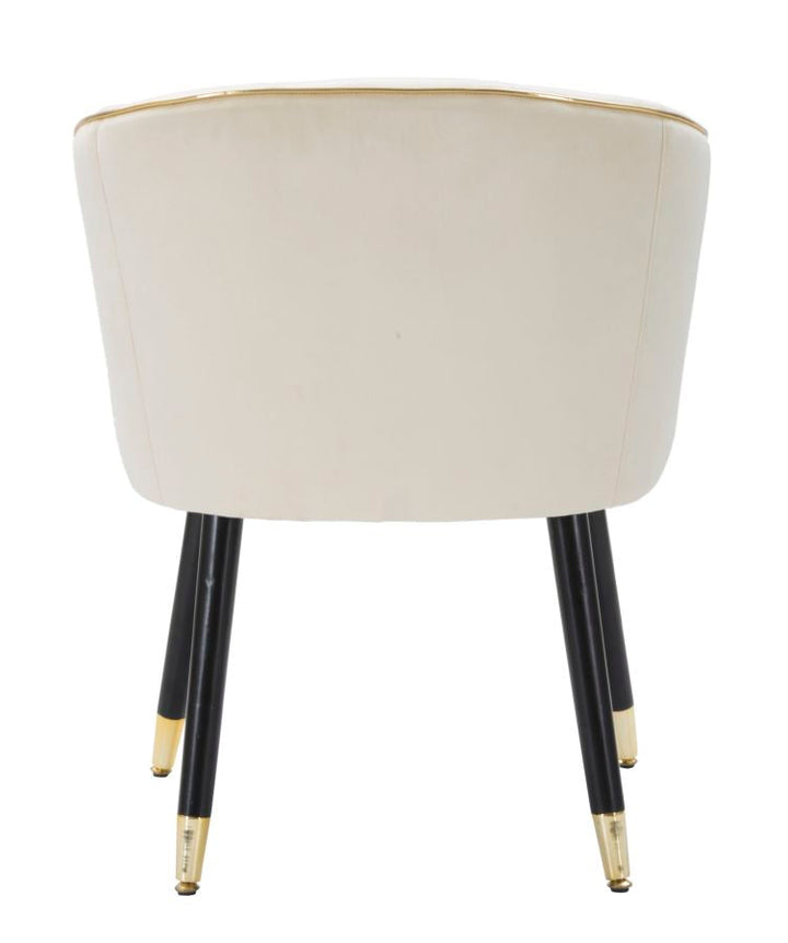 Cremefarbener gepolsterter Sessel mit schwarzen Holzbeinen und goldenen Details