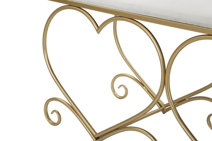 Cremefarbene Sitzbank mit herzförmigen goldenen Beinen