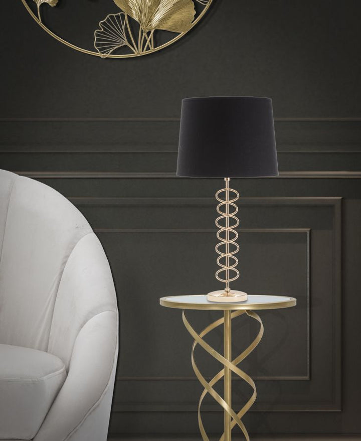 Goldfarbene und schwarze Metall-Tischlampe