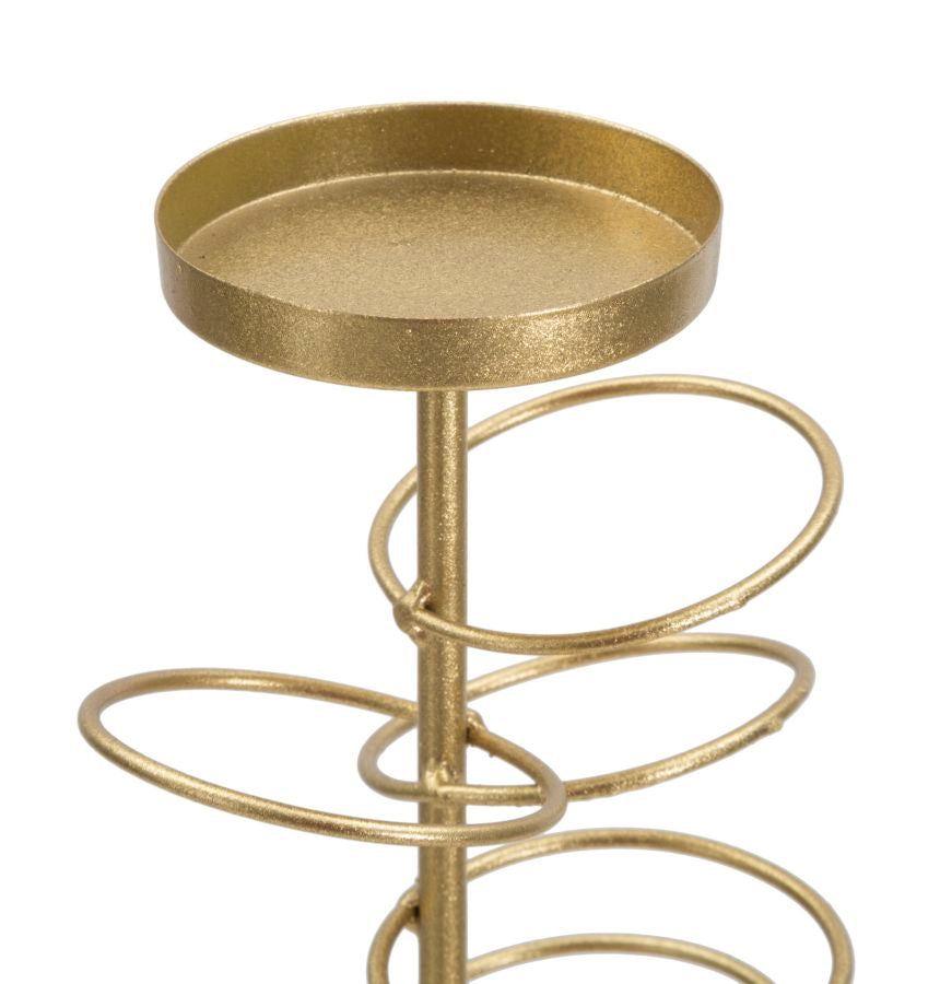 Ringförmiger Kerzenhalter aus Goldmetall auf weißem Marmorsockel