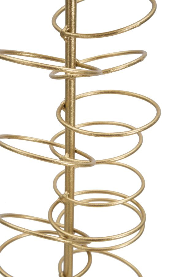 Ringförmiger Kerzenhalter aus Goldmetall auf weißem Marmorsockel