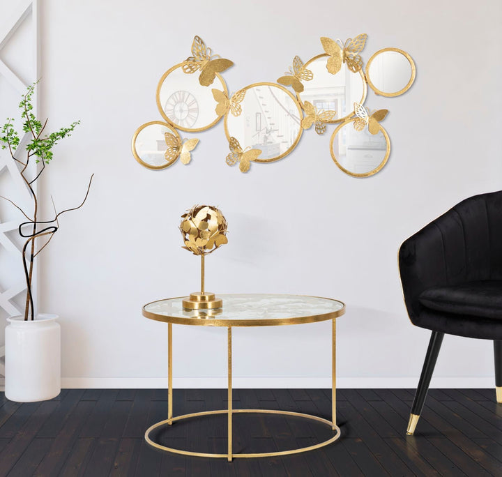 Runder Couchtisch aus goldenem Metall und Glas