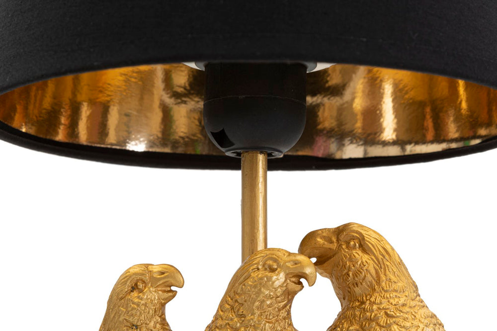 Schwarze Tischlampe mit goldenen Papageien