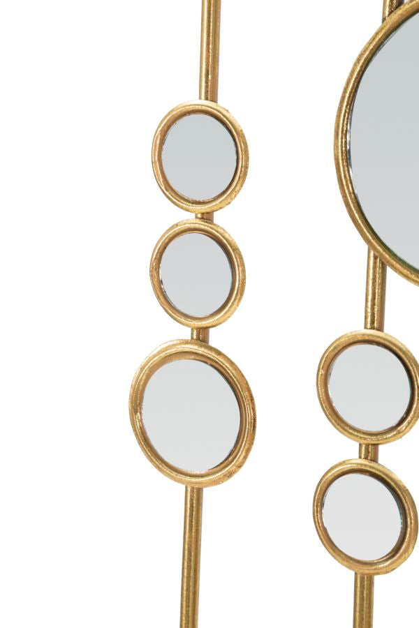 Kleine goldfarbene runde Wanddekoration