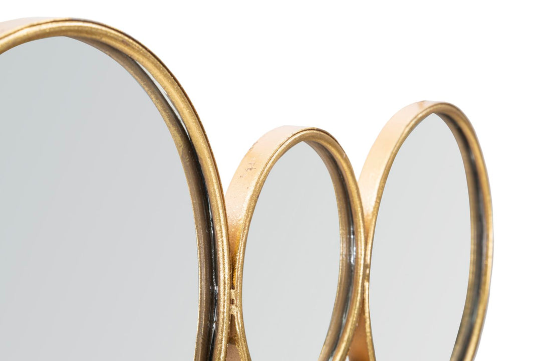 Kleine goldfarbene runde Wanddekoration