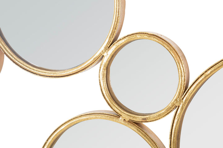 Kleine goldfarbene runde Wanddekoration