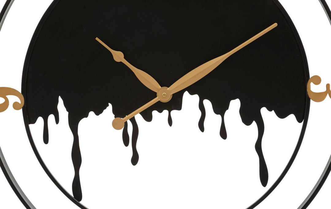 Moderne Wanduhr aus Metall in Gold und Schwarz