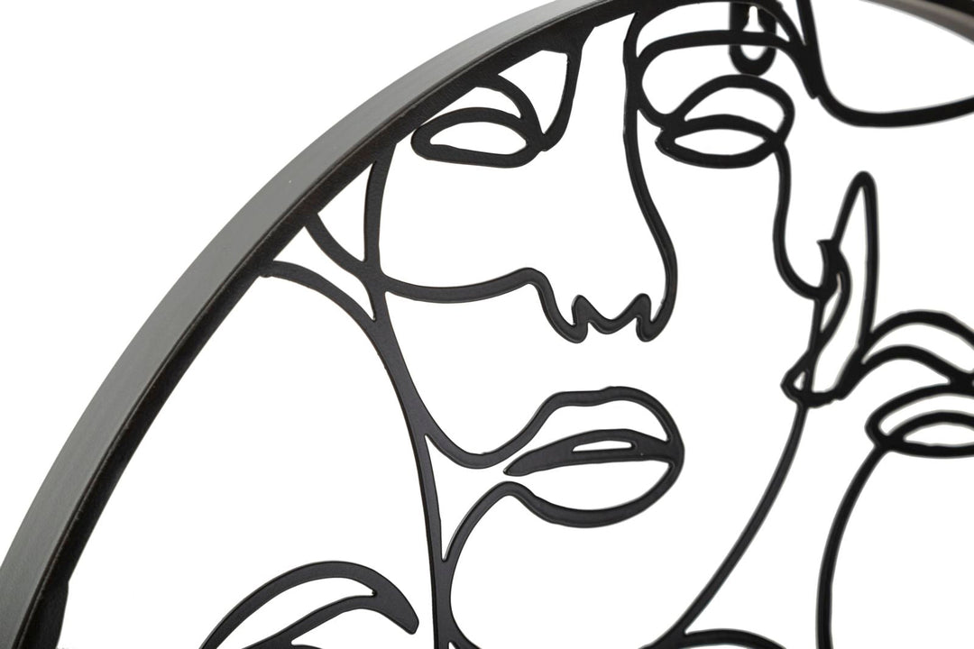 Schwarze Wanduhr mit abstrakten Gesichtern aus Metall