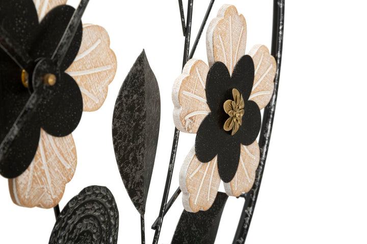 Schwarze Metall- und Holz-Wanduhr mit Blumenmuster