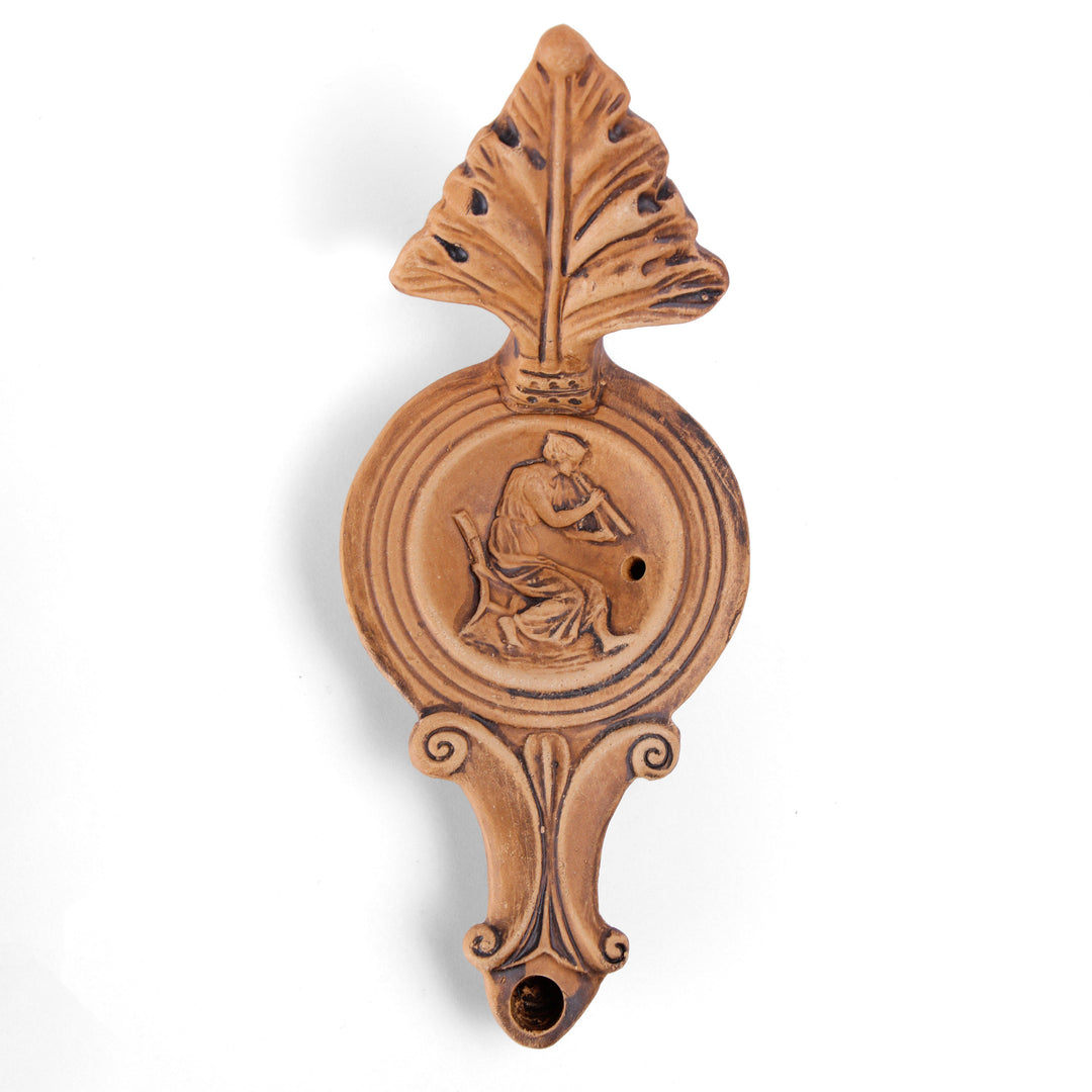Römische Öllampe mit Frauenfigur