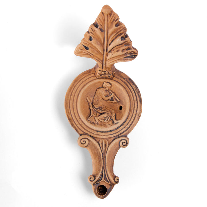 Römische Öllampe mit Frauenfigur