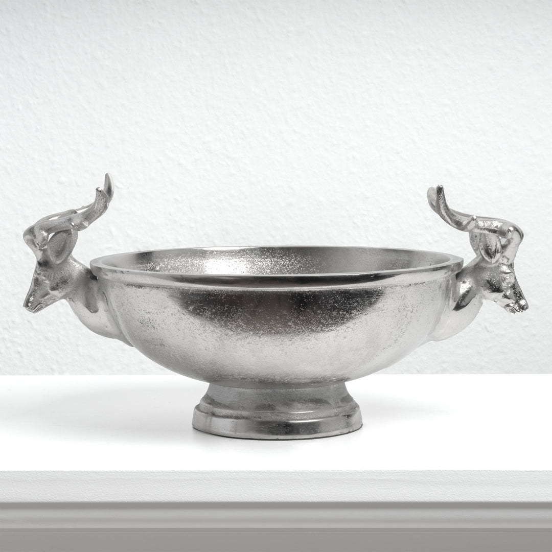Silberne Schale mit Hirschkopf-Griffen als Tischdekoration