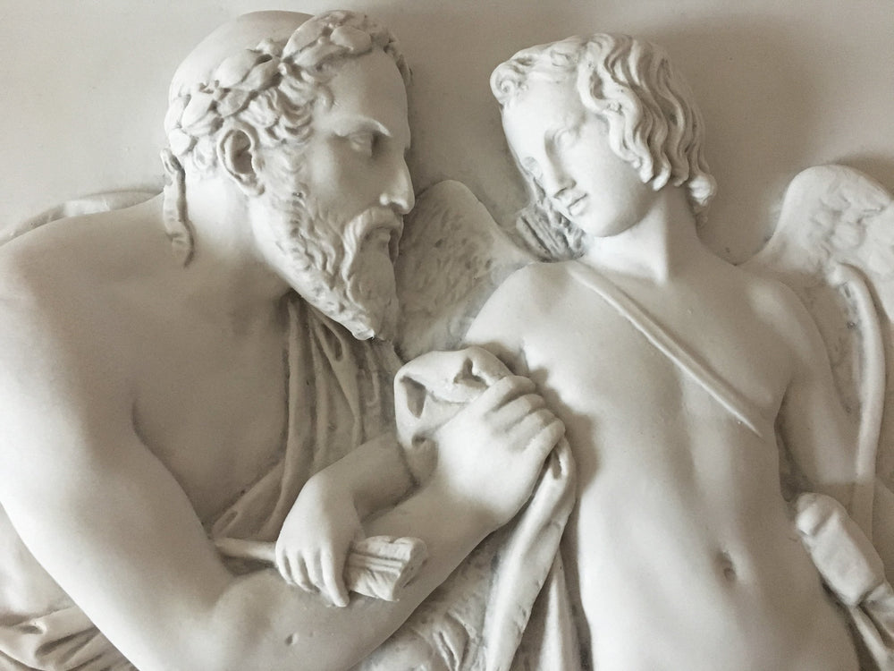 Relief Amor wird von Anakreon empfangen