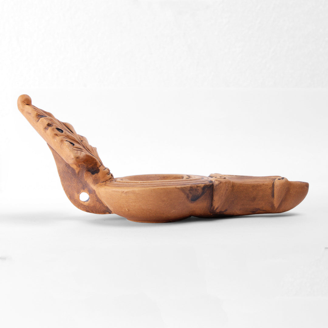 Römische Öllampe mit Frauenfigur