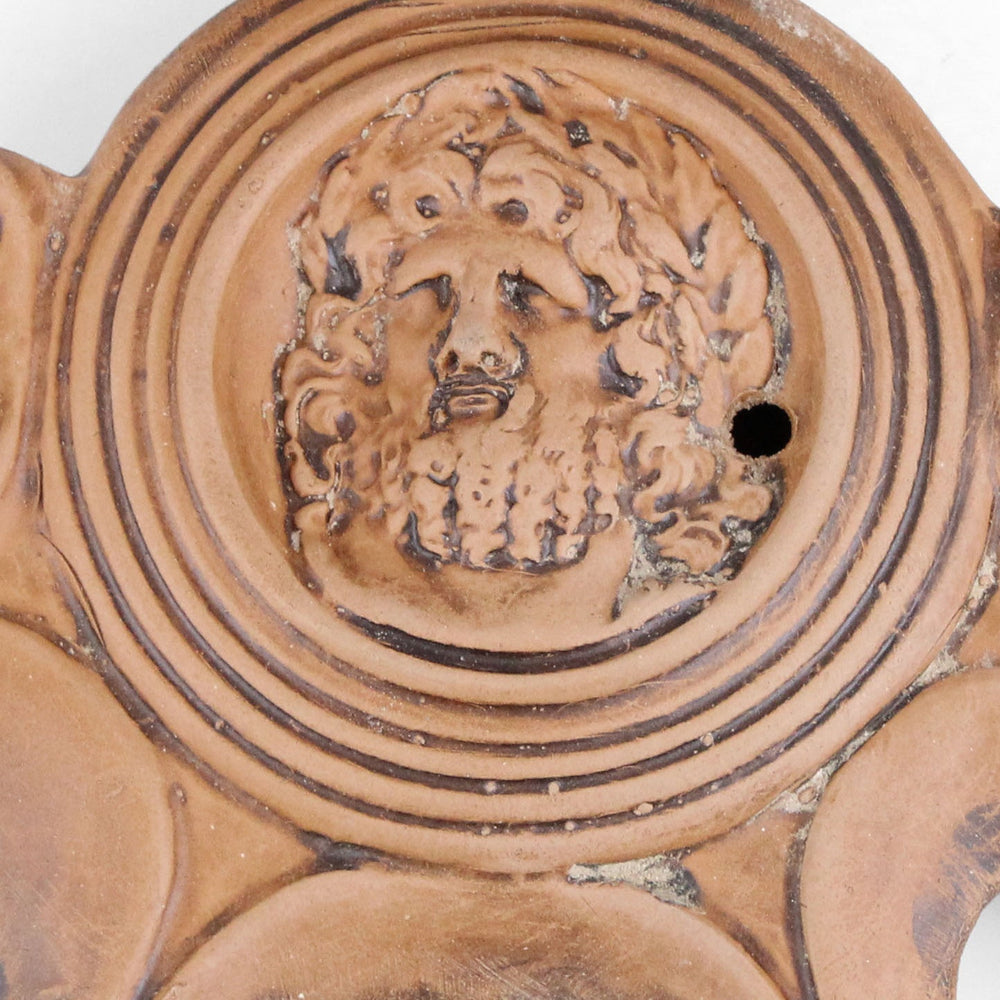 Öllampe mit Jupiter-Darstellung und vier Dochten