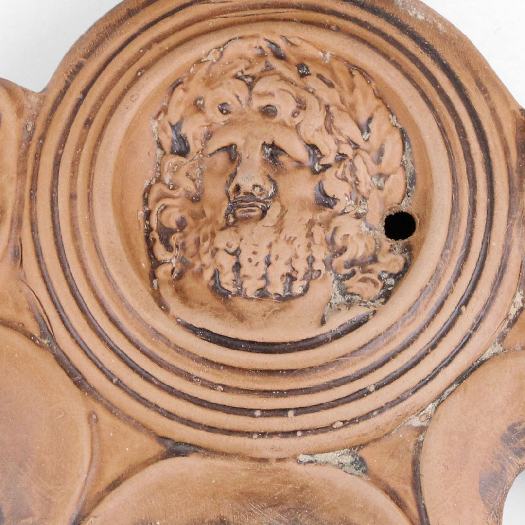 Öllampe mit Jupiter-Darstellung und vier Dochten
