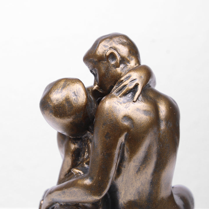 Der Kuss Statue von Rodin (Bronzierte Liebespaar Skulptur aus Kunstharz)