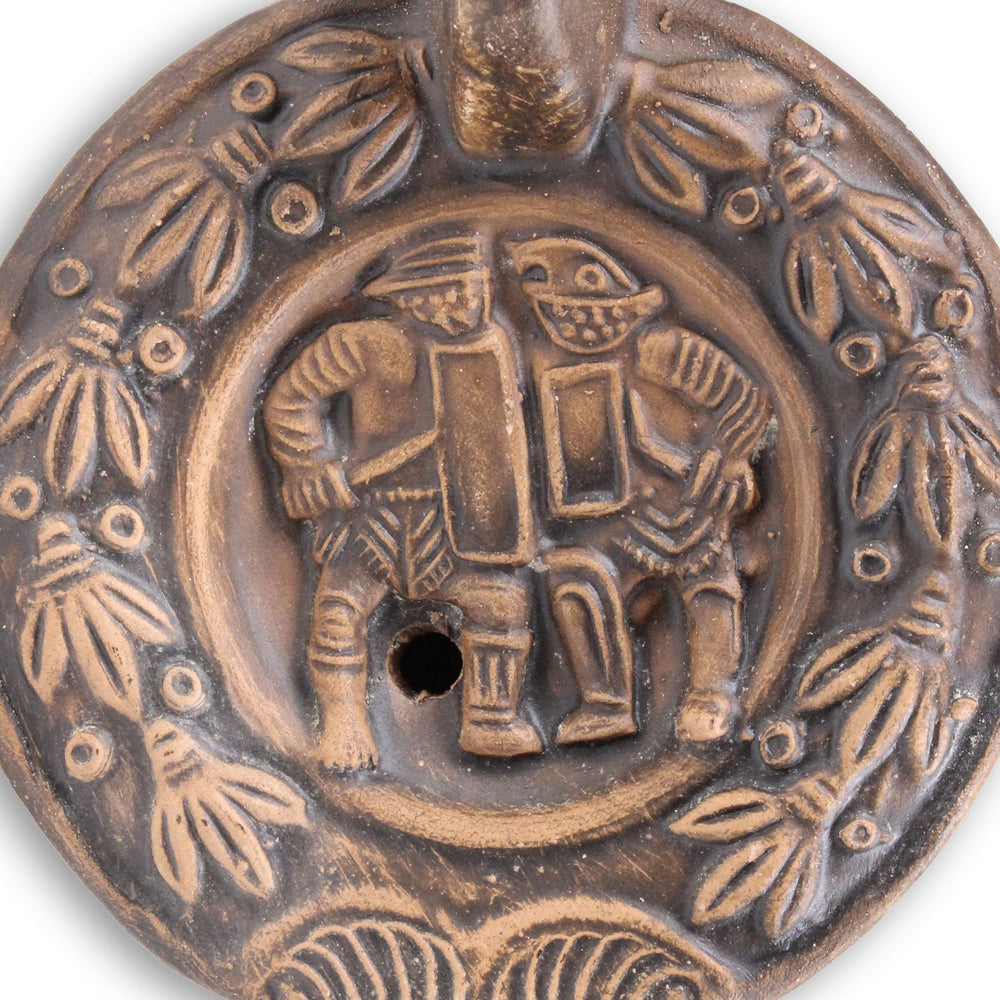Römische Öllampe mit Gladiatorenmotiv
